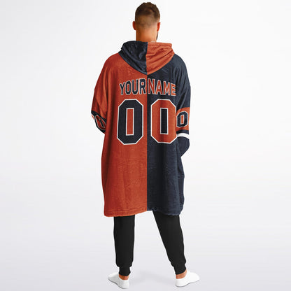 Navy, orange, and white halftime snug hoodie with three-tone split design and cozy fleece texture.