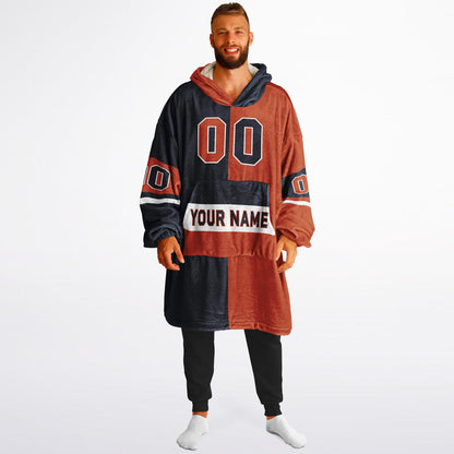 Navy, orange, and white halftime snug hoodie with three-tone split design and cozy fleece texture.