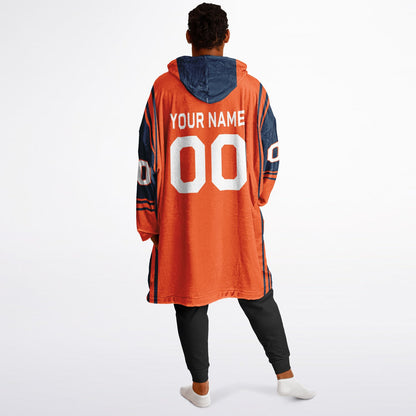Orange and navy bold snug hoodie with modern color-block design and soft loungewear fit.