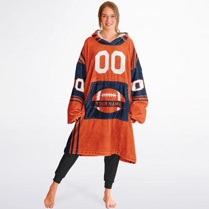 Orange and navy bold snug hoodie with modern color-block design and soft loungewear fit.
