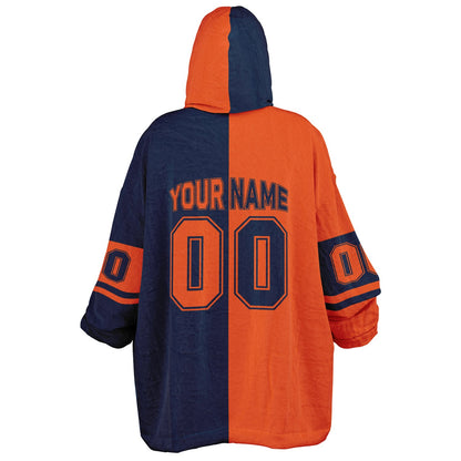 Orange and navy halftime snug hoodie featuring a symmetrical split design for a dynamic game-day look.