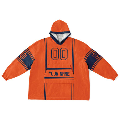Orange and navy lineup snug hoodie featuring sleek line-art details and minimalist team-inspired design.