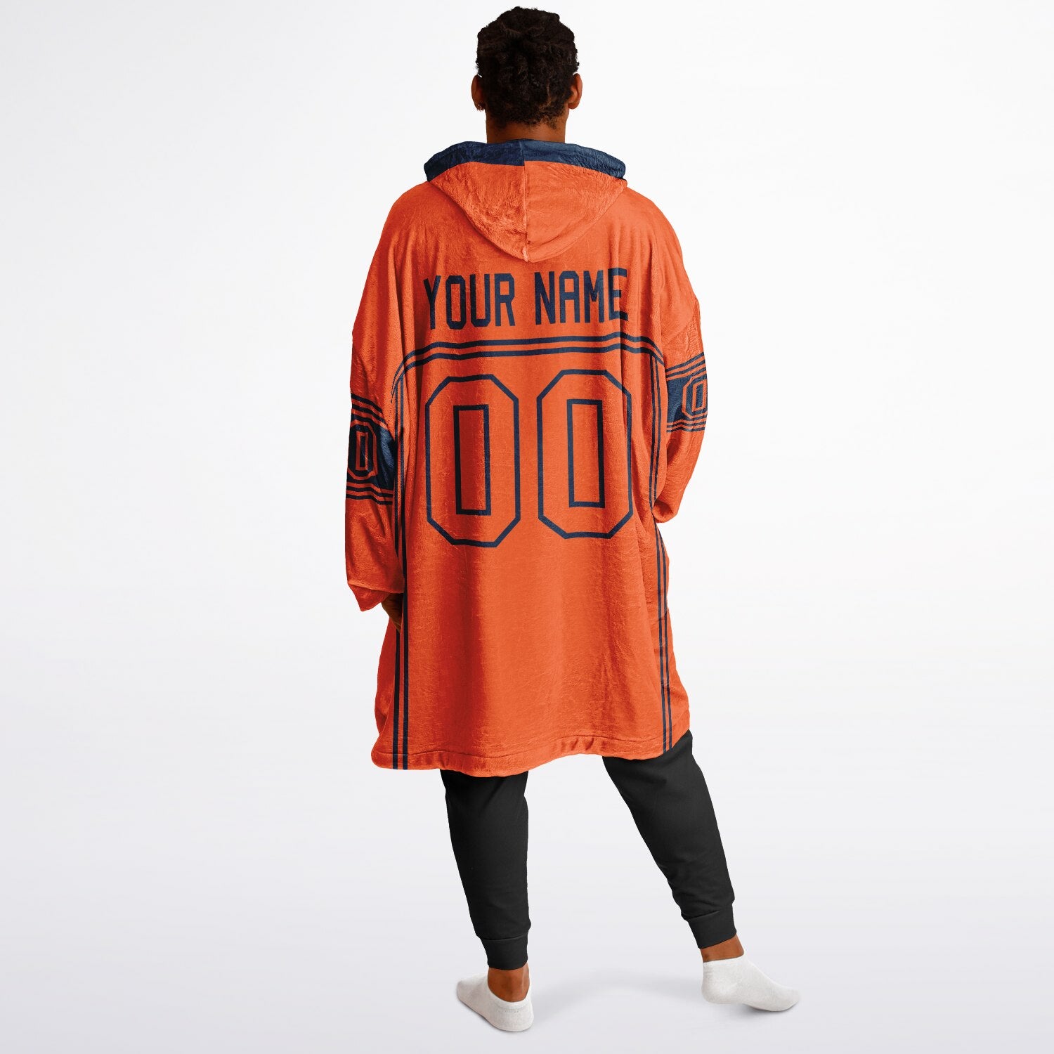 Orange and navy lineup snug hoodie featuring sleek line-art details and minimalist team-inspired design.
