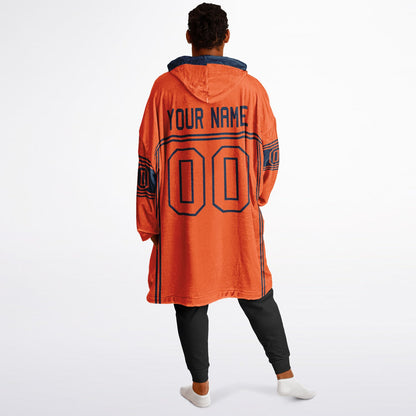 Orange and navy lineup snug hoodie featuring sleek line-art details and minimalist team-inspired design.