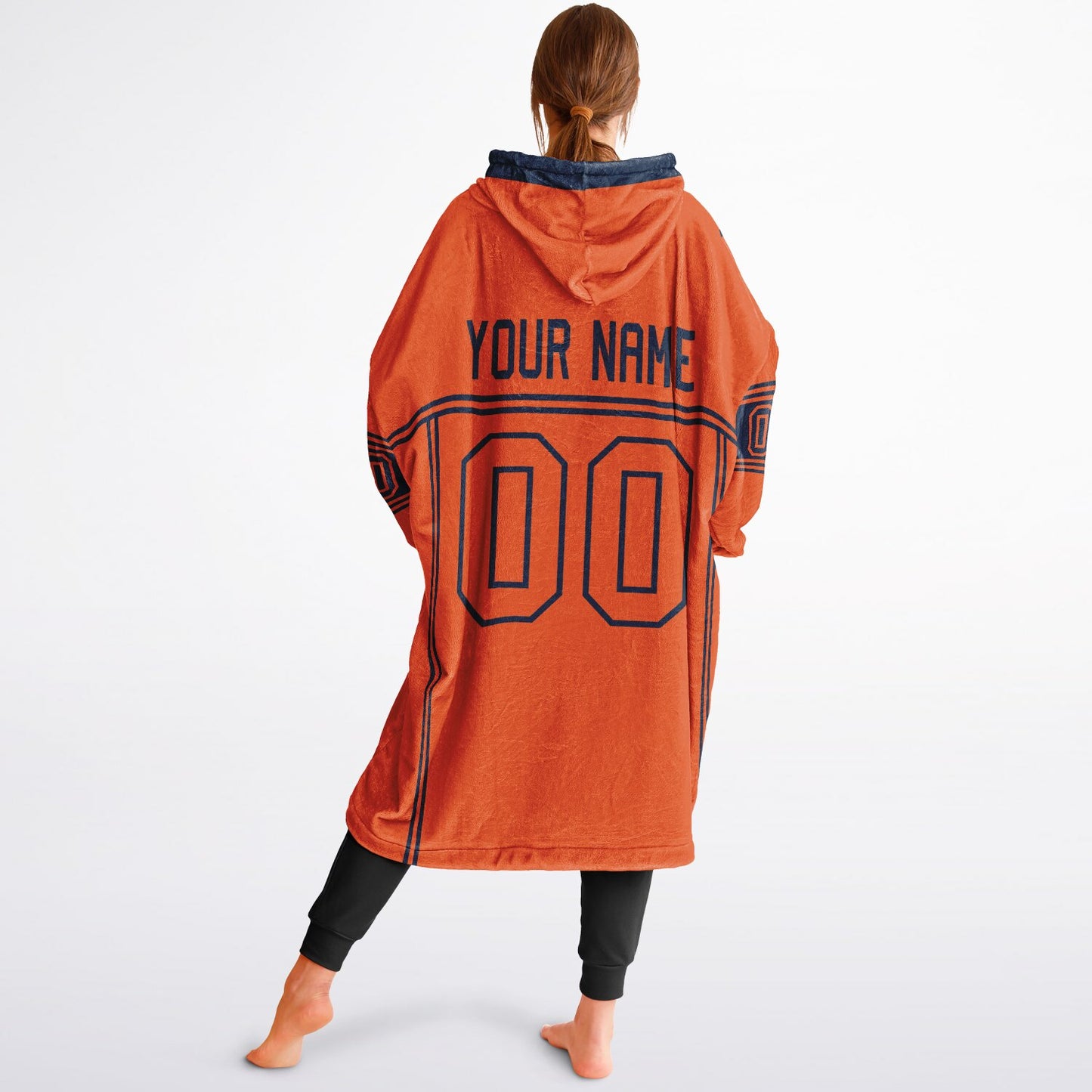 Orange and navy lineup snug hoodie featuring sleek line-art details and minimalist team-inspired design.