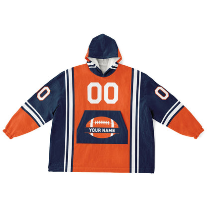 Orange, navy, and white bold snug hoodie with triple color blocking and a sporty aesthetic.
