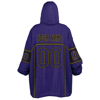 Purple, black, and metallic gold lineup snug hoodie with clean line work and subtle jersey influence.