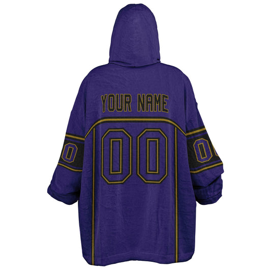 Purple, black, and metallic gold lineup snug hoodie with clean line work and subtle jersey influence.