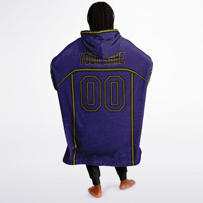 Purple, black, and metallic gold lineup snug hoodie with clean line work and subtle jersey influence.