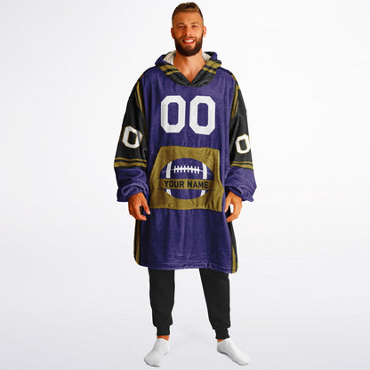 Purple, black, metallic gold bold snug hoodie with triple color blocking and a sporty aesthetic.