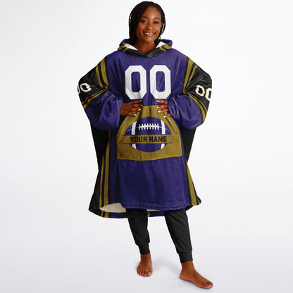 Purple, black, metallic gold bold snug hoodie with triple color blocking and a sporty aesthetic.