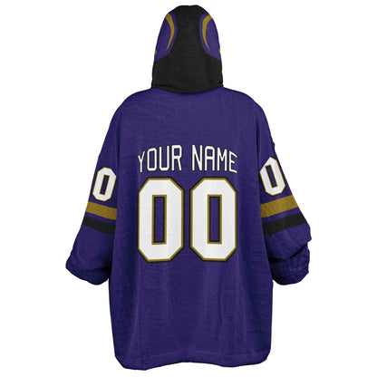 Purple, black, and metallic gold classic snug hoodie featuring authentic jersey striping and personalized number details.