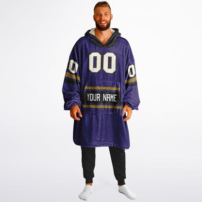 Purple, black, and metallic gold classic snug hoodie featuring authentic jersey striping and personalized number details.