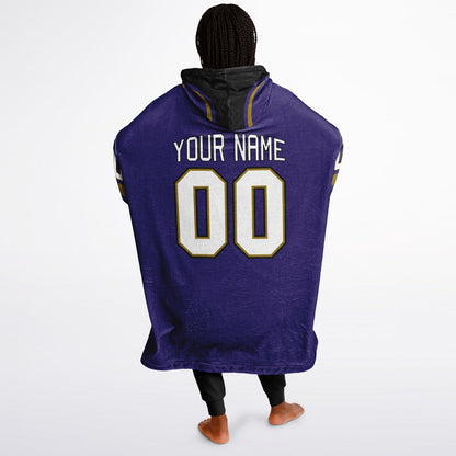 Purple, black, and metallic gold classic snug hoodie featuring authentic jersey striping and personalized number details
