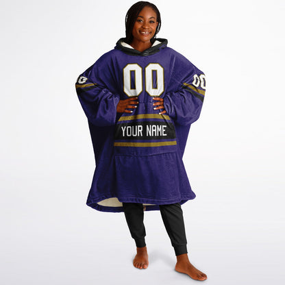 Purple, black, and metallic gold classic snug hoodie featuring authentic jersey striping and personalized number details.