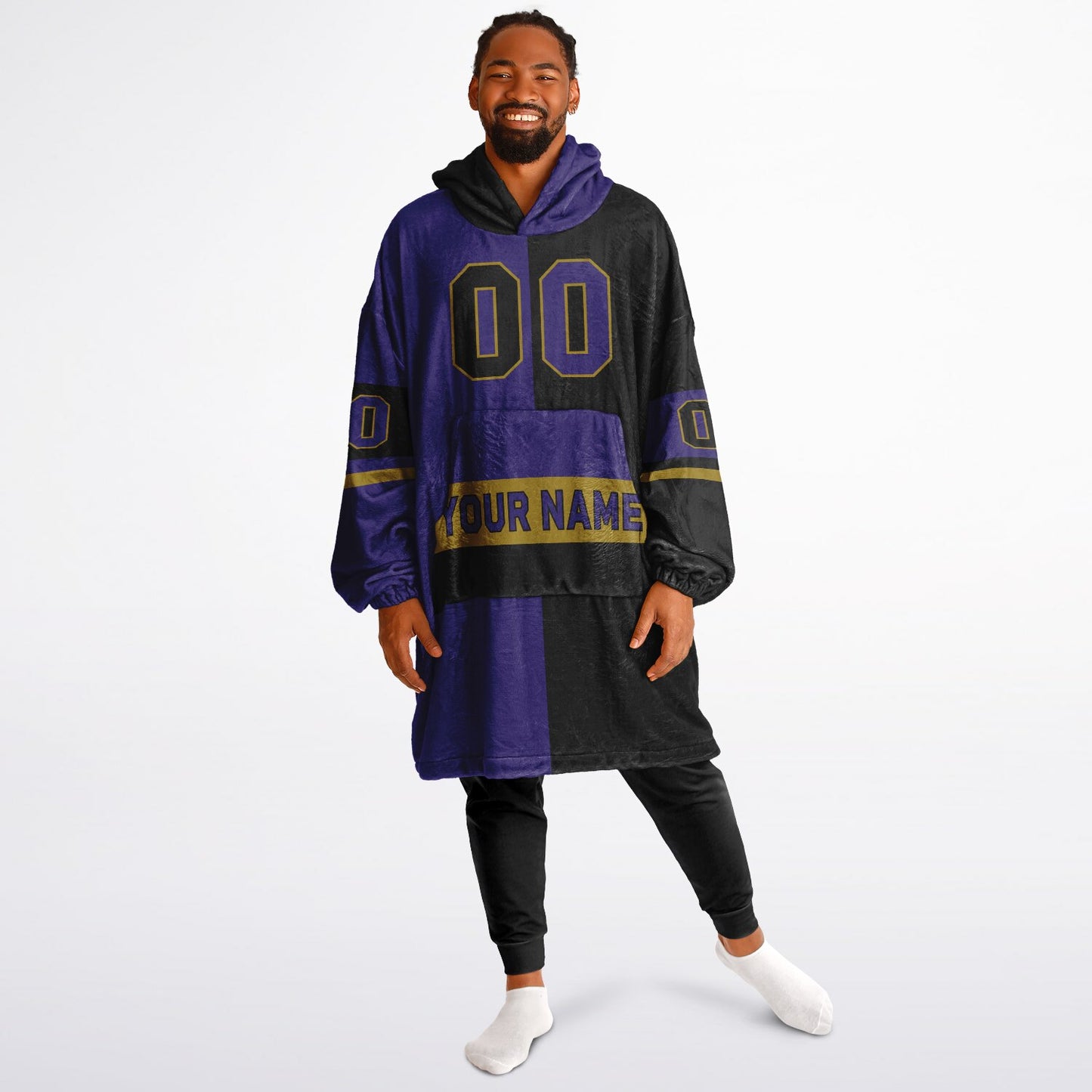 Purple, black, and metallic gold halftime snug hoodie with three-tone split design and cozy fleece texture.