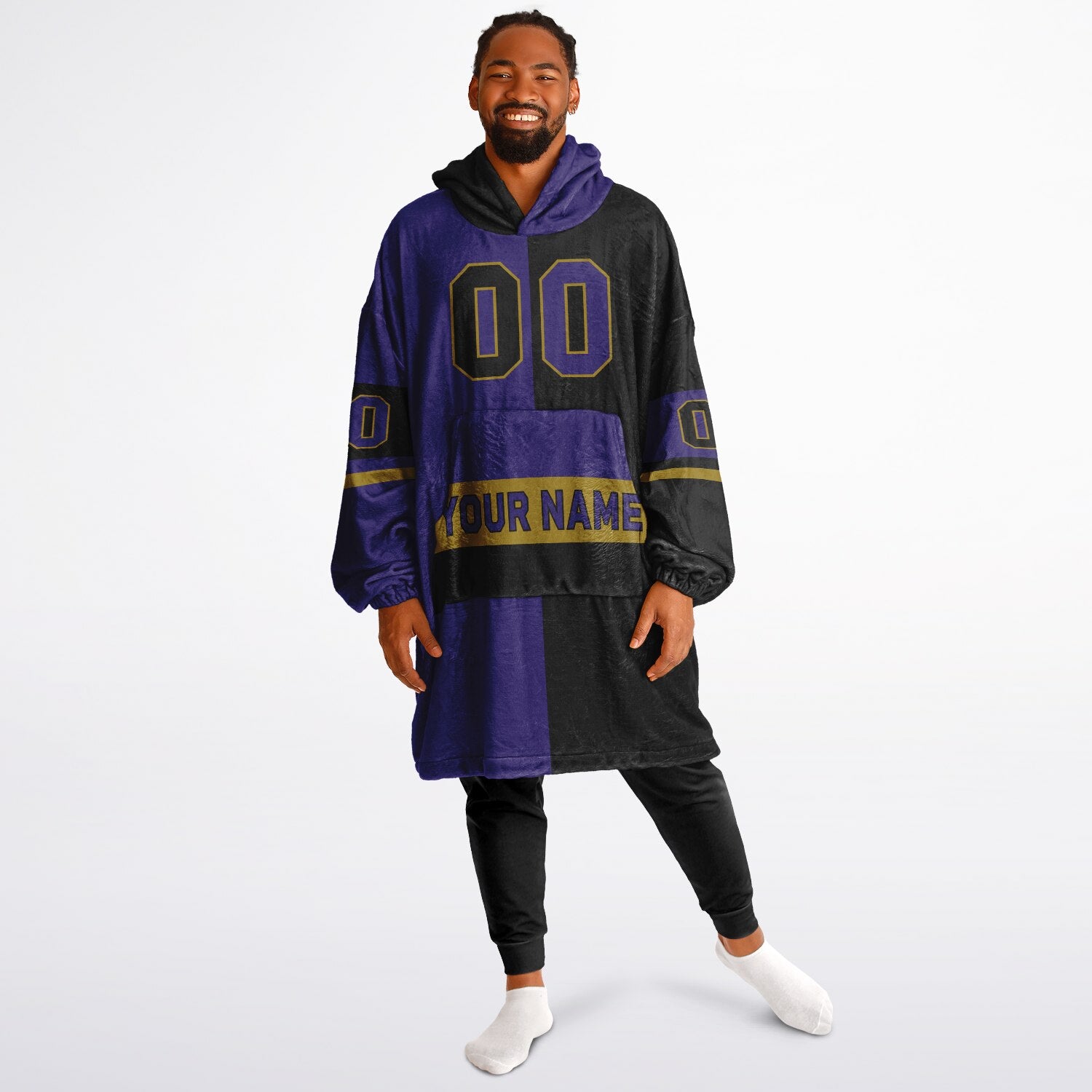 Purple, black, and metallic gold halftime snug hoodie with three-tone split design and cozy fleece texture.