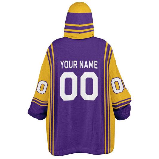 Purple and gold bold snug hoodie with modern color-block design and soft loungewear fit.