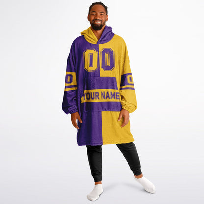 Purple and gold halftime snug hoodie featuring a symmetrical split design for a dynamic game-day look.