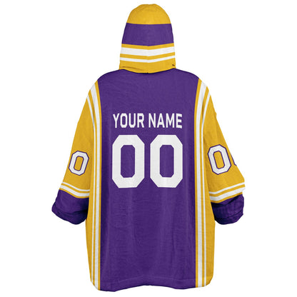 Purple, gold, and white bold snug hoodie with triple color blocking and a sporty aesthetic.