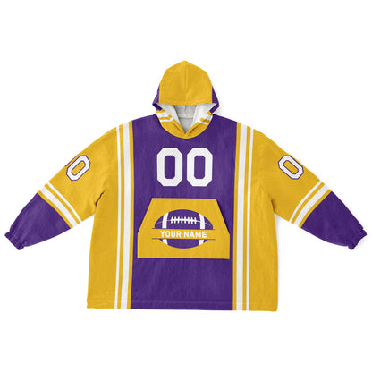 Purple, gold, and white bold snug hoodie with triple color blocking and a sporty aesthetic.
