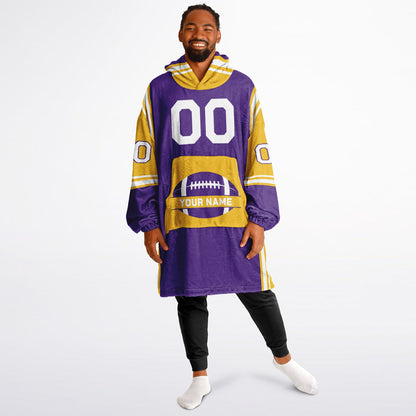 Purple, gold, and white bold snug hoodie with triple color blocking and a sporty aesthetic.