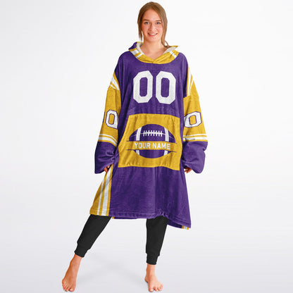 Purple, gold, and white bold snug hoodie with triple color blocking and a sporty aesthetic.