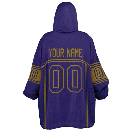 Purple and metallic gold lineup snug hoodie featuring sleek line-art details and minimalist team-inspired design.