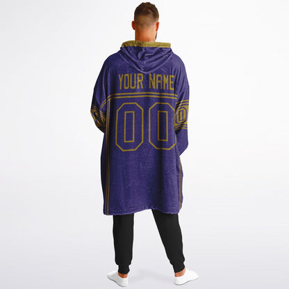 Purple and metallic gold lineup snug hoodie featuring sleek line-art details and minimalist team-inspired design.