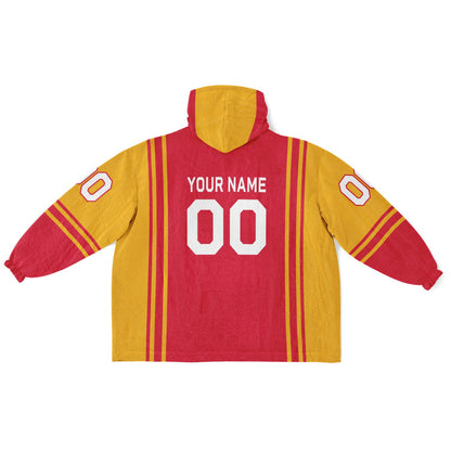 Red and gold bold snug hoodie with modern color-block design and soft loungewear fit.