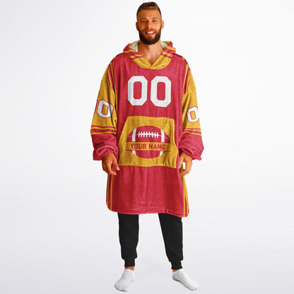 Red and gold bold snug hoodie with modern color-block design and soft loungewear fit.