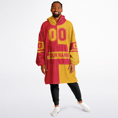 Red and gold halftime snug hoodie featuring a symmetrical split design for a dynamic game-day look.