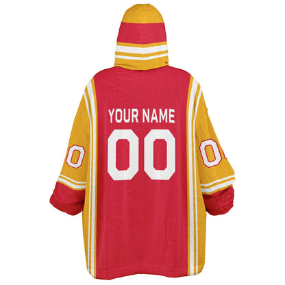 Red, gold, and white bold snug hoodie with triple color blocking and a sporty aesthetic.