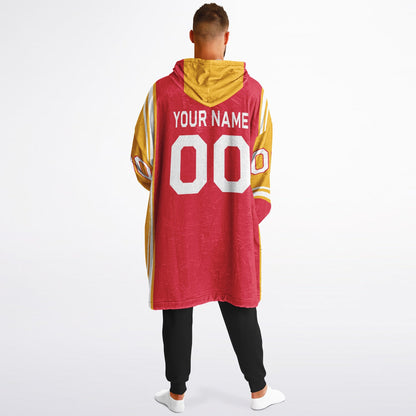 Red, gold, and white bold snug hoodie with triple color blocking and a sporty aesthetic.
