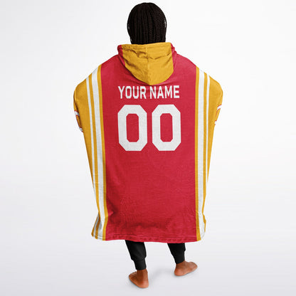 Red, gold, and white bold snug hoodie with triple color blocking and a sporty aesthetic.
