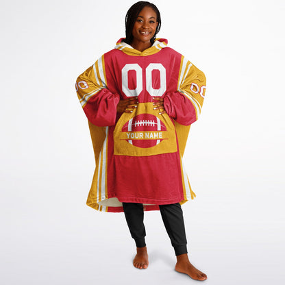 Red, gold, and white bold snug hoodie with triple color blocking and a sporty aesthetic.