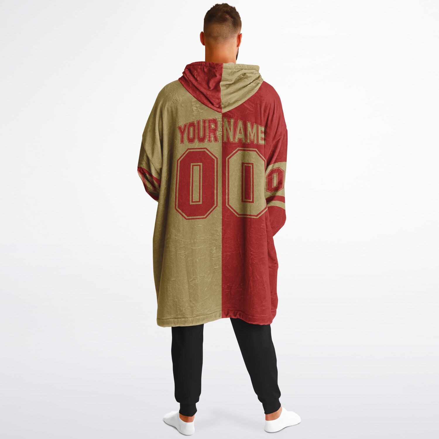 Red and metallic gold halftime snug hoodie featuring a symmetrical split design for a dynamic game-day look.