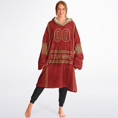 Red and metallic gold lineup snug hoodie featuring sleek line-art details and minimalist team-inspired design.