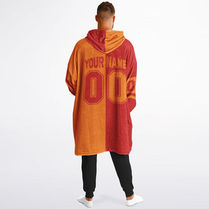 Red and orange halftime snug hoodie featuring a symmetrical split design for a dynamic game-day look.