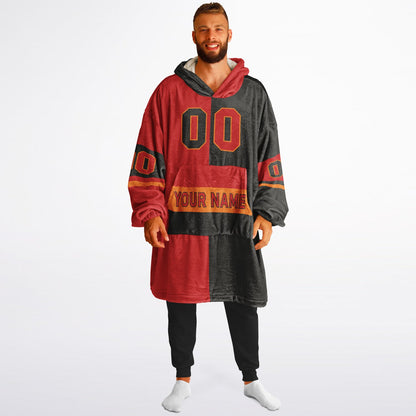 Red, pewter, and orange halftime snug hoodie with three-tone split design and cozy fleece texture.