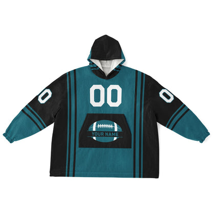 Teal and black bold snug hoodie with modern color-block design and soft loungewear fit.
