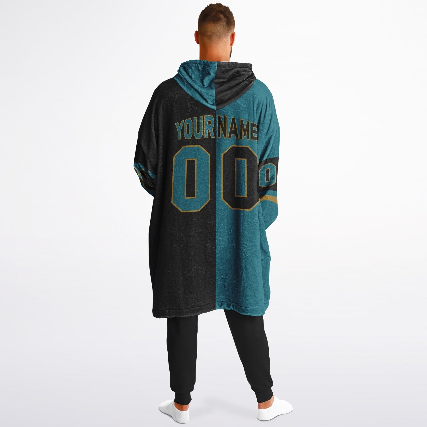 Teal, black, and gold halftime snug hoodie with three-tone split design and cozy fleece texture.