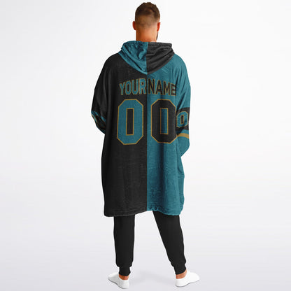 Teal, black, and gold halftime snug hoodie with three-tone split design and cozy fleece texture.