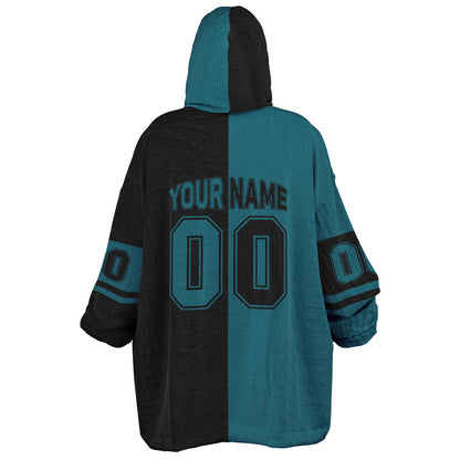 Teal and black halftime snug hoodie featuring a symmetrical split design for a dynamic game-day look.