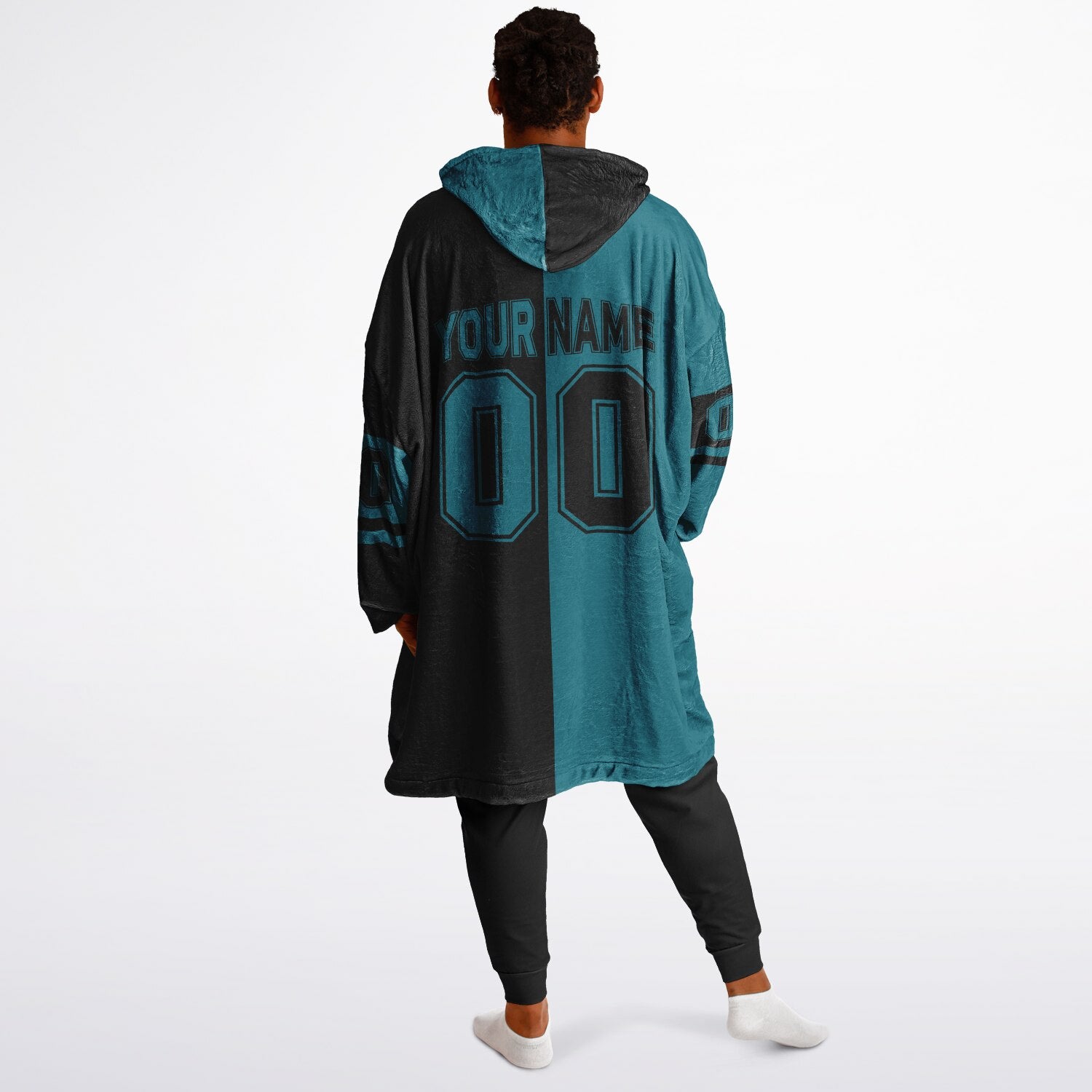 Teal and black halftime snug hoodie featuring a symmetrical split design for a dynamic game-day look.