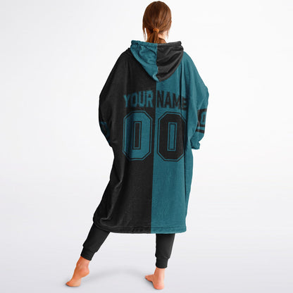 Teal and black halftime snug hoodie featuring a symmetrical split design for a dynamic game-day look.