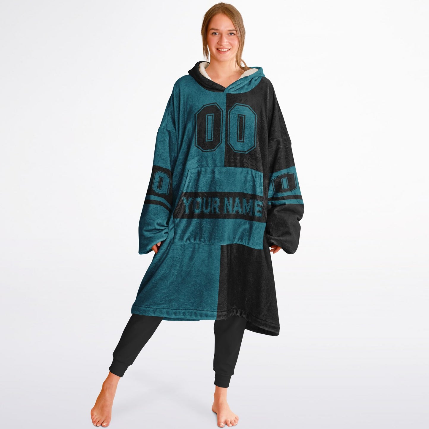 Teal and black halftime snug hoodie featuring a symmetrical split design for a dynamic game-day look.