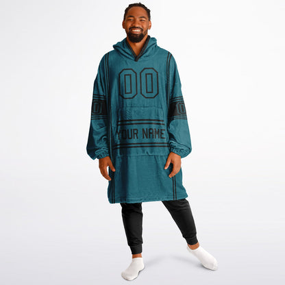 Teal and black lineup snug hoodie featuring sleek line-art details and minimalist team-inspired design.