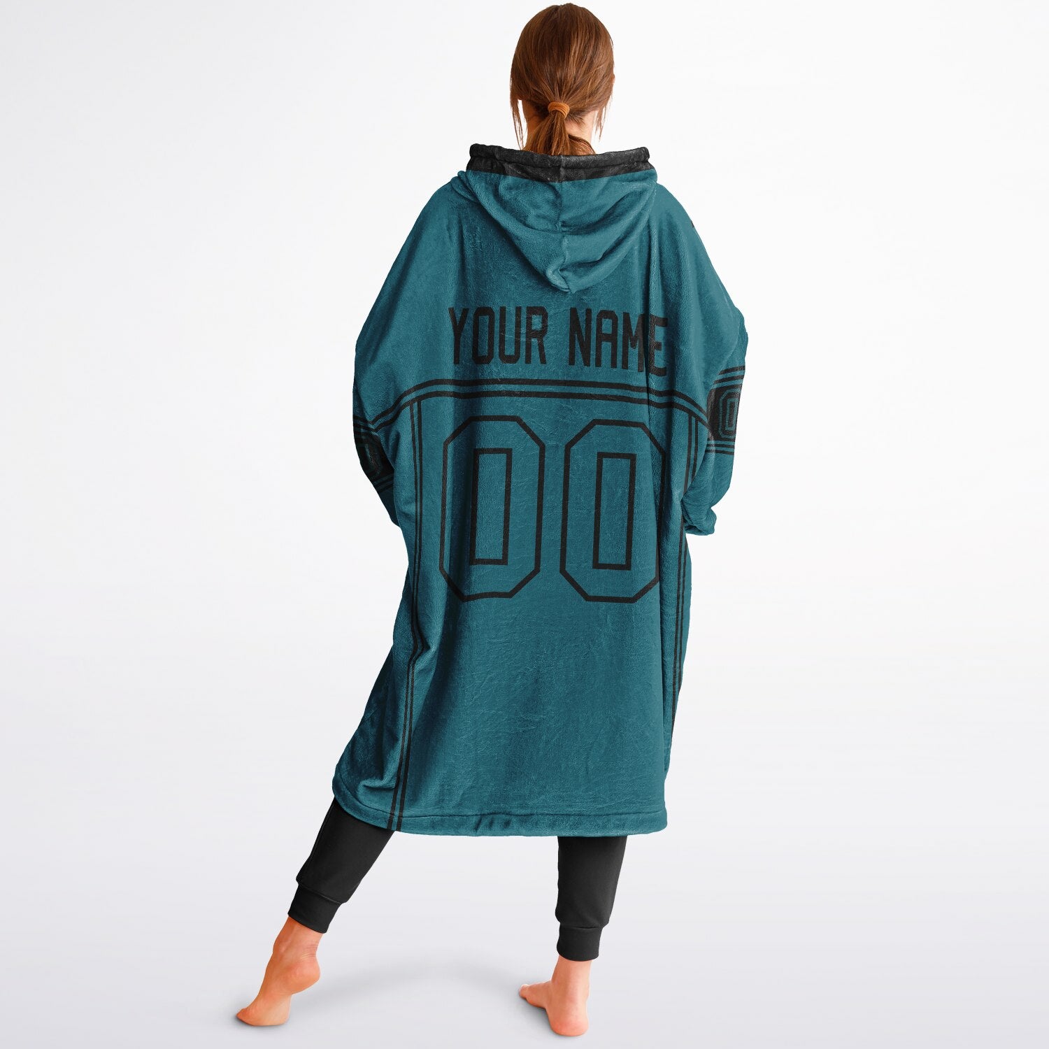 Teal and black lineup snug hoodie featuring sleek line-art details and minimalist team-inspired design.