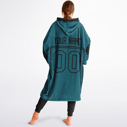 Teal and black lineup snug hoodie featuring sleek line-art details and minimalist team-inspired design.